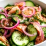Cucumber Smoked Salmon Salad in a White Ceramic Bowl
